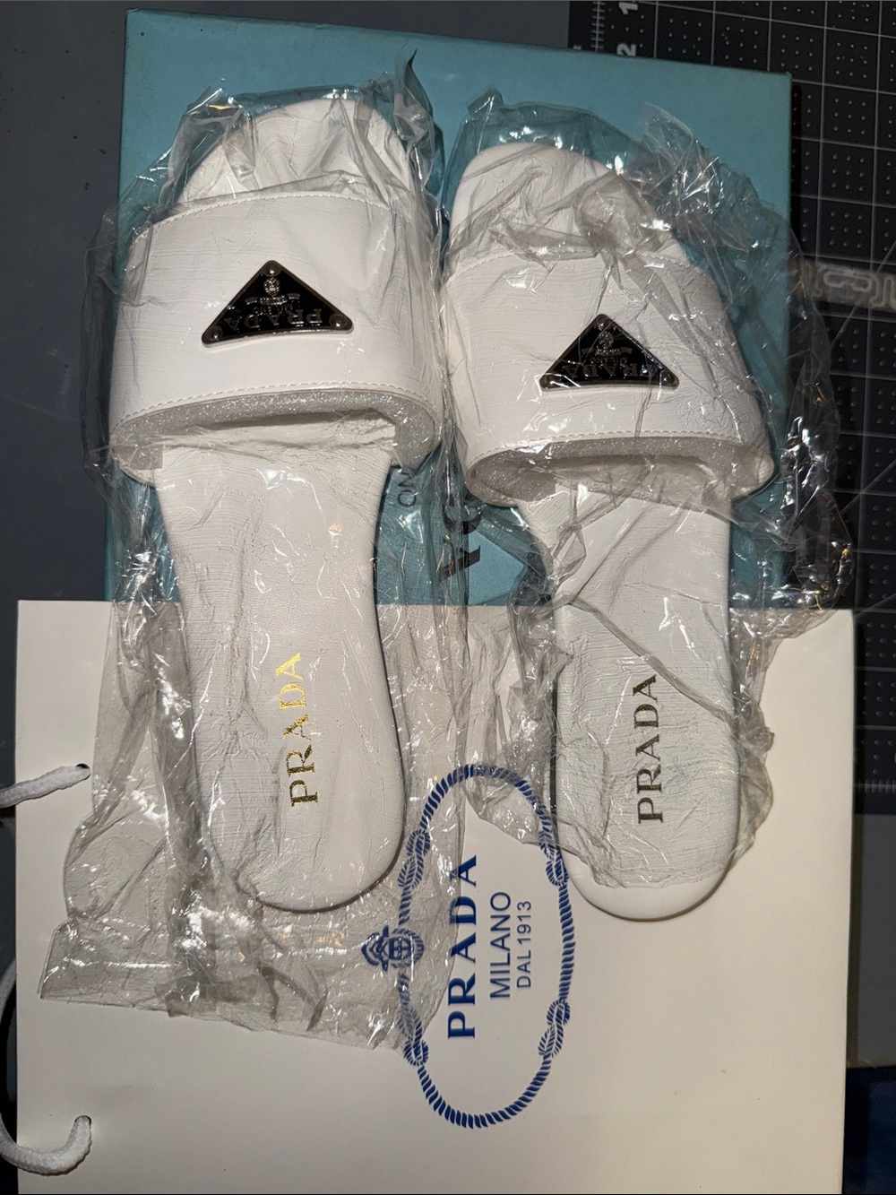 Prada White Leather Slide Sandals with Triangular Logo Plate